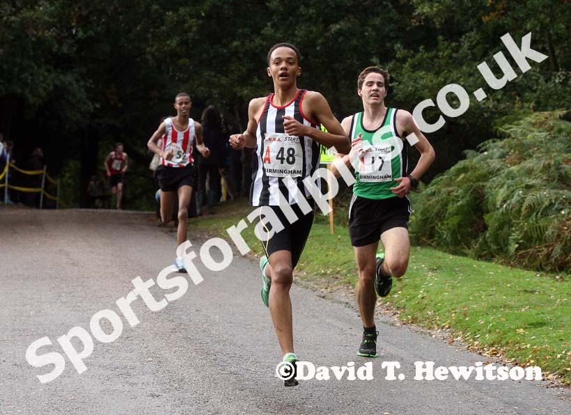 James Lewis (Shaftsbury Barnet) leads James McCarthy (Chiltern harriers AC) on the first leg of the under-17 men. Photo: David T. Hewitson/Sports for All Pics